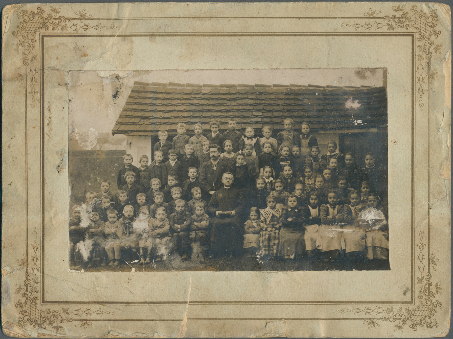 Adolf Hitler at the age of 6 (4th from the left on the top row) with his classmates in Fischlham, Austria-Hungary